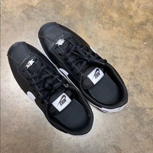 Black and white Nike Cortez